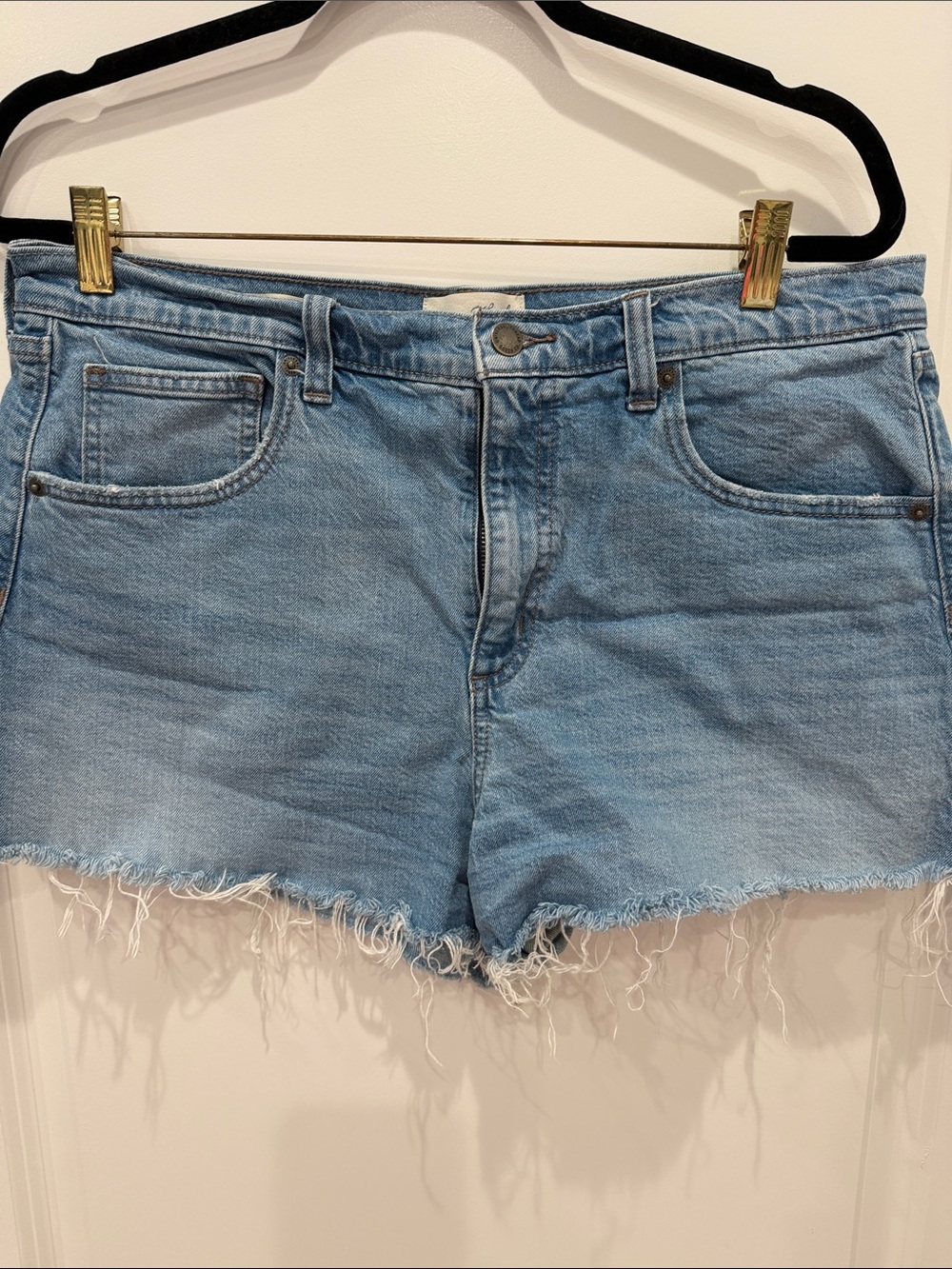 Universal Thread Light Wash Denim Cutoff Shorts with Frayed Hem